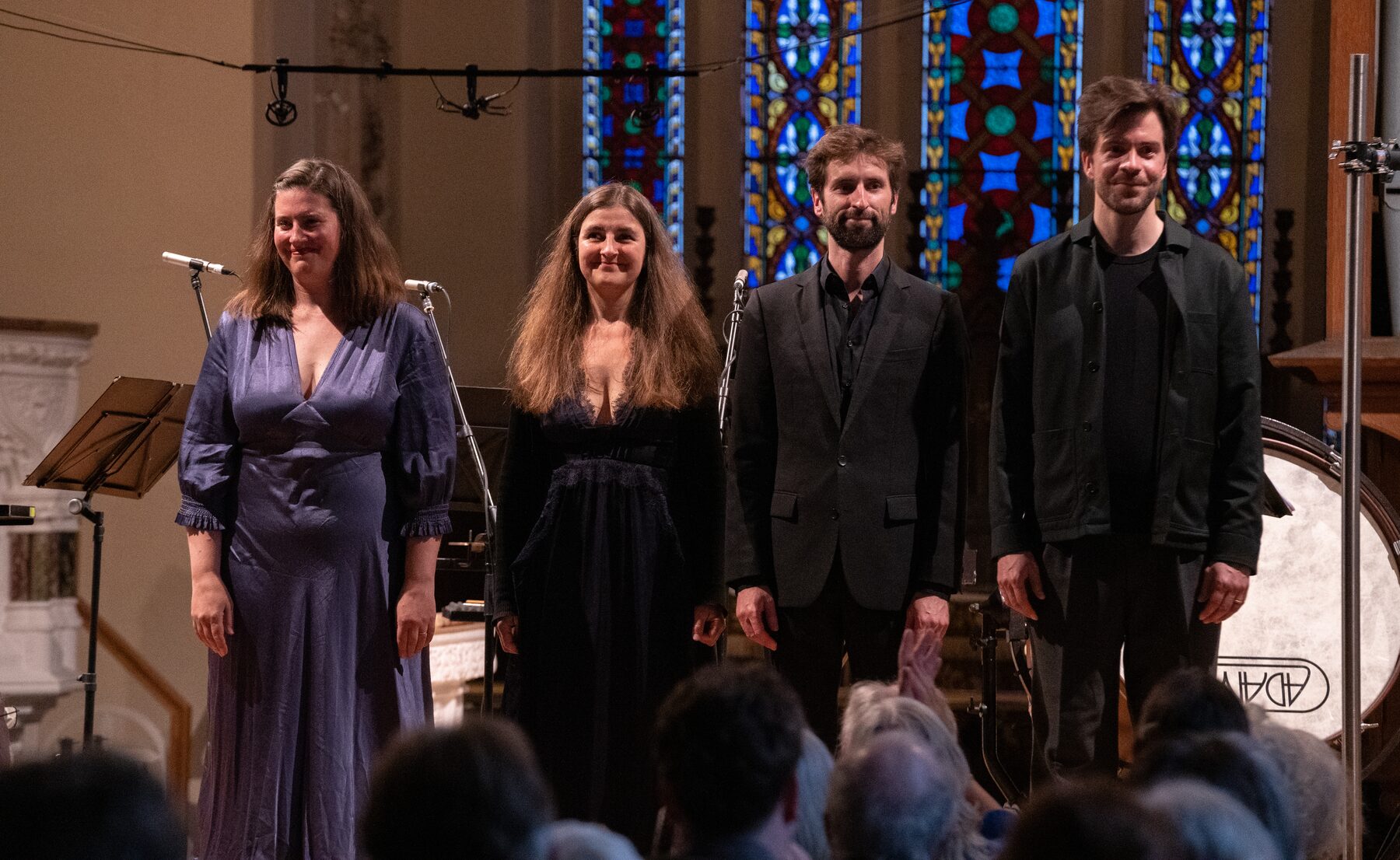 The four singers of Damask taking a bow after a concert